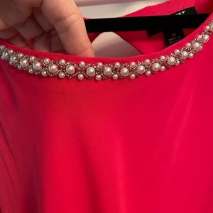 Coral formal dress with beading and pearls